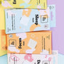Vitamin patch packs labeled Energy, Sleep, Focus, and Day displayed on a pastel-colored background